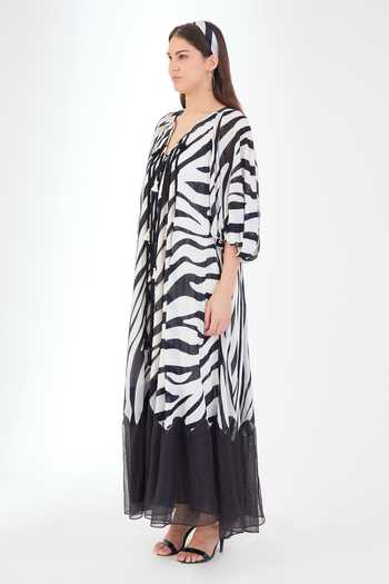 Nikasha_Black Viscose, Georgette Tassels Round Neck Animal Print Tiered Dress _Online_at_Aza_Fashions