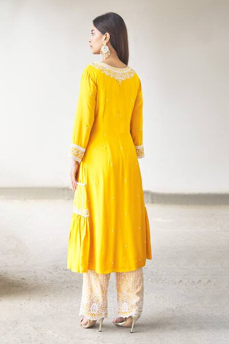 Shop_Aariyana Couture_Yellow Cotton, Silk, Organza, Bamboo Tassels, Cut Work, Flared Kurta Set_at_Aza_Fashions
