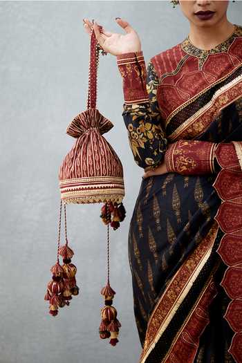 Buy Torani Red Gota Patti Gulnar Zeina Embroidered Potli at Aza Fashions Buy_Torani_Red Gota Patti Gulnar Zeina Embroidered Potli_at_Aza_Fashions
