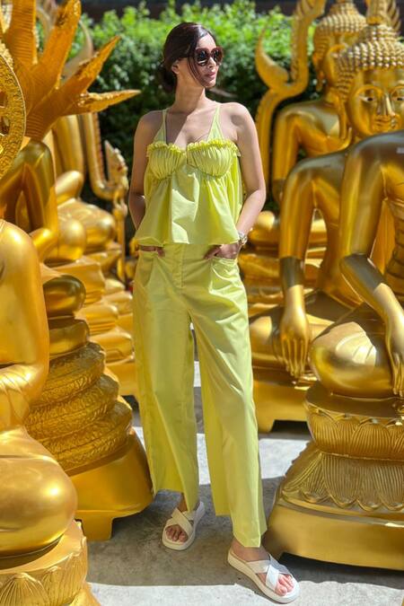 Shop Ekastories Green Cotton Ruffles Split V-neck Draped Top And Wide Leg Pant Set Online at Aza Fashions Shop_Ekastories_Green Cotton Ruffles Split V-neck Draped Top And Wide Leg Pant Set_Online_at_Aza_Fashions