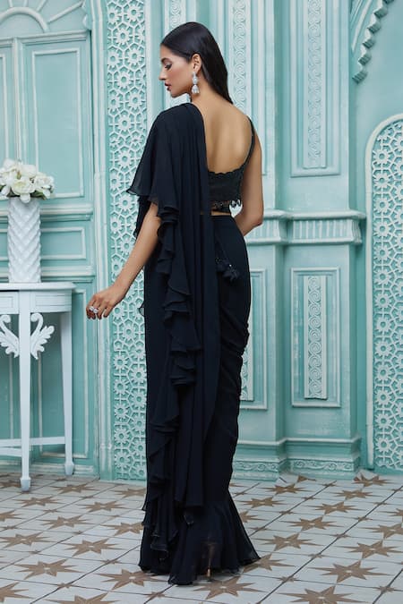 Shop Aariyana Couture Black Viscose, Georgette Sequins Scoop Draped Ruffle Saree And Work Blouse Set at Aza Fashions Shop_Aariyana Couture_Black Viscose, Georgette Sequins Scoop Draped Ruffle Saree And Work Blouse Set_at_Aza_Fashions