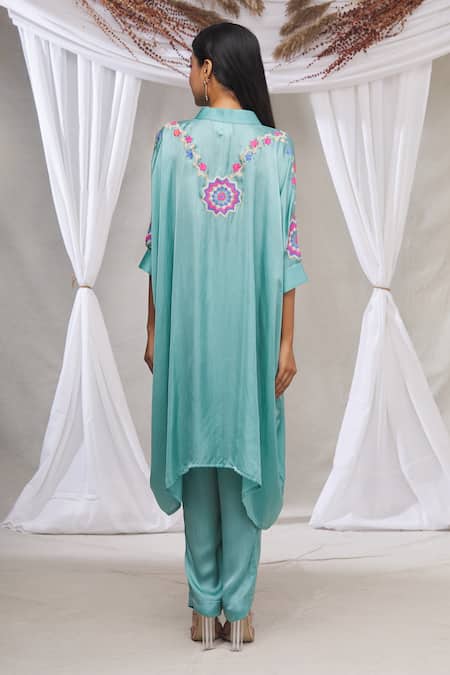 Shop Made In Pinkcity Blue Satin Floral Motifs Mandarin Collar Asymmetric Kurta And Pant Set at Aza Fashions Shop_Made In Pinkcity_Blue Satin Floral Motifs Mandarin Collar Asymmetric Kurta And Pant Set_at_Aza_Fashions
