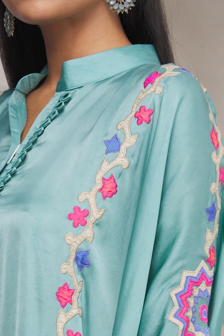 Made In Pinkcity Blue Satin Floral Motifs Mandarin Collar Asymmetric Kurta And Pant Set at Aza Fashions Made In Pinkcity_Blue Satin Floral Motifs Mandarin Collar Asymmetric Kurta And Pant Set_at_Aza_Fashions