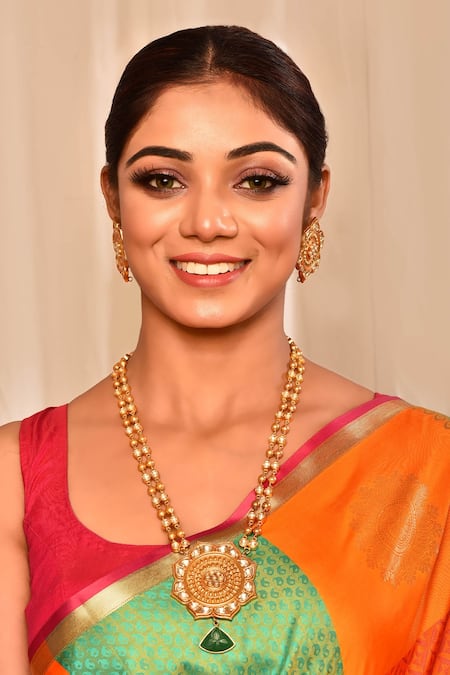 Buy The Bling Girll Gold Plated Stones, Pearls Floral Carved Drop Necklace And Earring Set Online at Aza Fashions Buy_The Bling Girll_Gold Plated Stones, Pearls Floral Carved Drop Necklace And Earring Set _Online_at_Aza_Fashions