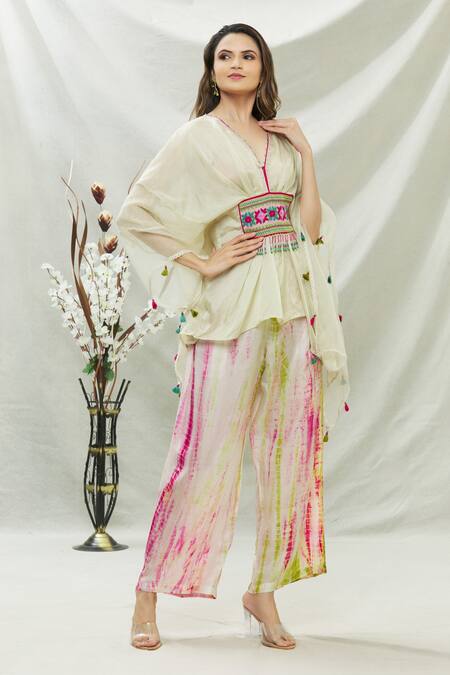 Capisvirleo White Habutai Silk Thread And Beads V Neck Ameen Asymmetric Tunic & Palazzo Set Online at Aza Fashions Capisvirleo_White Habutai Silk Thread And Beads V Neck Ameen Asymmetric Tunic & Palazzo Set _Online_at_Aza_Fashions