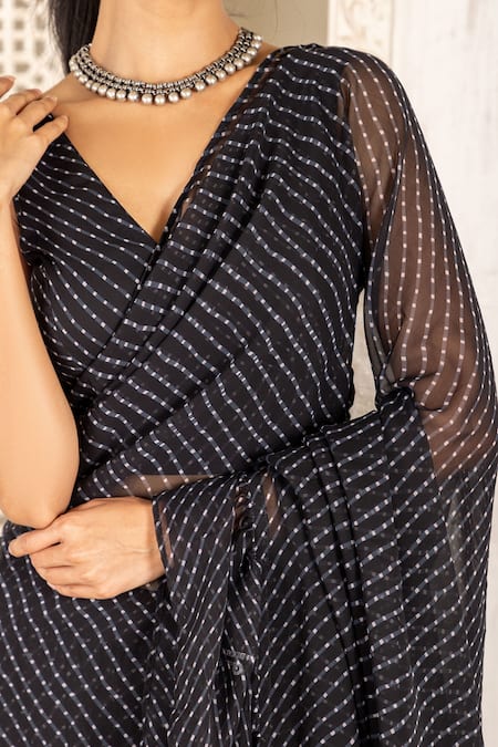 Inara Jaipur_Black Georgette Printed V Pre-draped Ruffle Saree With Blouse_at_Aza_Fashions