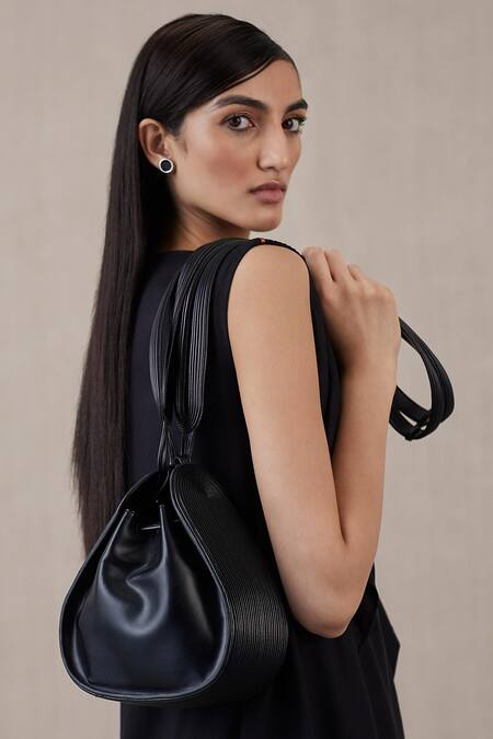 Buy Ampm Black Cut Work Mahra Bucket Bag at Aza Fashions Buy_Ampm_Black Cut Work Mahra Bucket Bag _at_Aza_Fashions