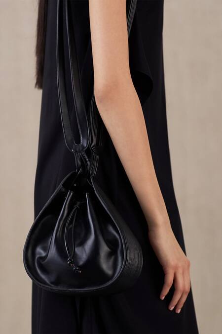 Buy Ampm Black Cut Work Mahra Bucket Bag Online at Aza Fashions Buy_Ampm_Black Cut Work Mahra Bucket Bag _Online_at_Aza_Fashions