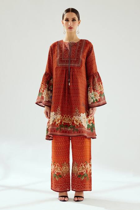 Rajdeep Ranawat_Orange Satin Permaz Floral And Geometric Print Pant_Online_at_Aza_Fashions