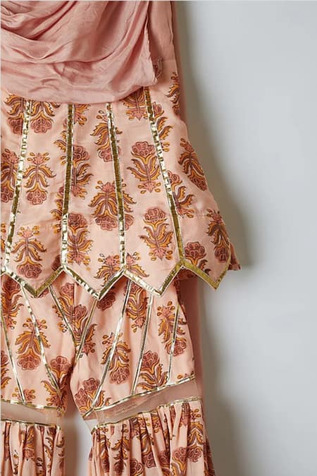 Shop_Yuvraani Jaipur_Pink Muslin, Net Gota Patti, Embroidery Gotapatti Draped Peplum Top And Sharara _Online_at_Aza_Fashions