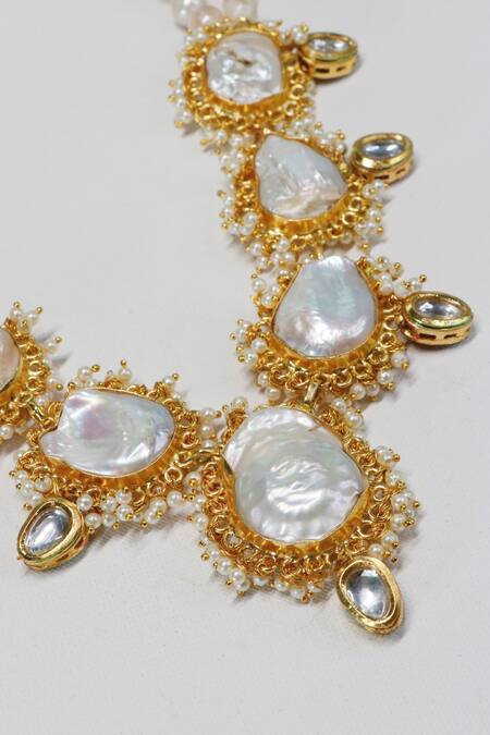 Shop Ishhaara Gold Plated Pearls Kundan Shell Necklace Set Online at Aza Fashions Shop_Ishhaara_Gold Plated Pearls Kundan Shell Necklace Set _Online_at_Aza_Fashions