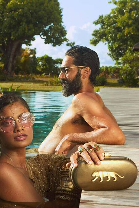 Shop Sabyasachi Gold Embellished Capsule Clutch at Aza Fashions Shop_Sabyasachi_Gold Embellished Capsule Clutch _at_Aza_Fashions