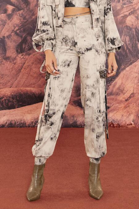 Mellowdrama_Black Tencel, Denim Studs Bandeau Neck Washed Pattern Bomber Jogger Set_at_Aza_Fashions