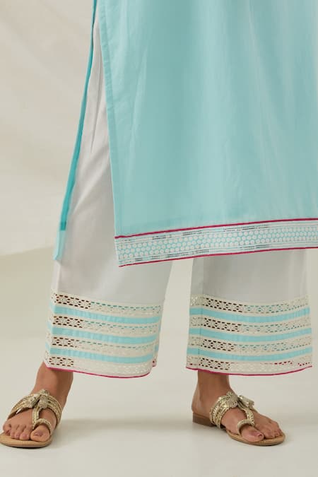 The Indian Cause_Blue Cotton Piping, Embroidery, Sequins Round Placed Butti Kurta Palazzo Set _at_Aza_Fashions