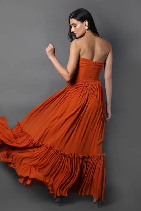 Swatee Singh Orange Georgette Bandeau Neck Pleated Hem Corset Gown at Aza Fashions Swatee Singh_Orange Georgette Bandeau Neck Pleated Hem Corset Gown _at_Aza_Fashions