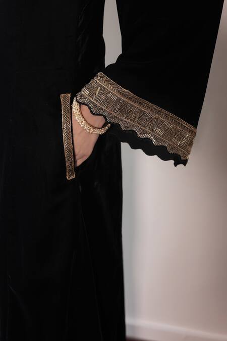 Shrutkirti_Black Silk, Velvet Tassels V-neck Sleeve Embroidered Kurta Palazzo Set_at_Aza_Fashions