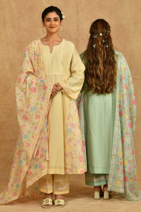 Ekavira_Yellow Chanderi Tassels Split V-neck A-line Printed Kurta Set_at_Aza_Fashions