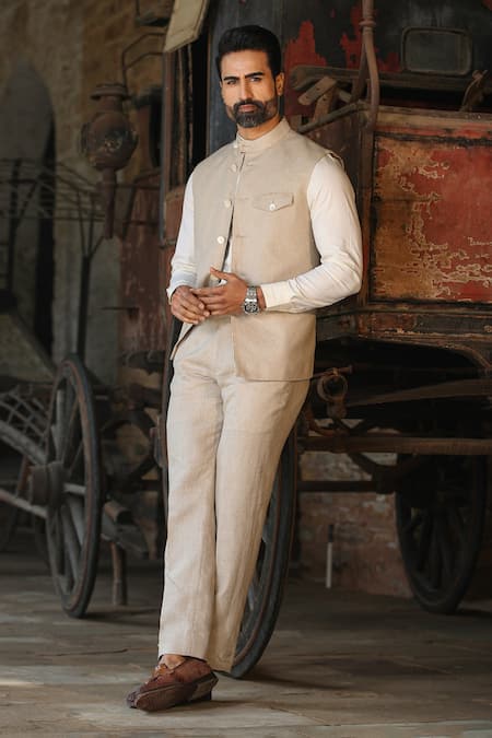 Raw & Rustic By Niti Bothra_Beige Linen Buttoned Hem Handcrafted Straight Pant _at_Aza_Fashions