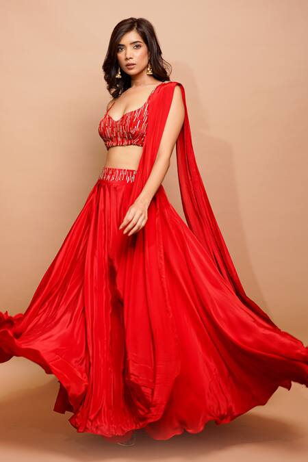 Ahi Clothing Red Crepe Sequins, Cut Work, Zari Hand Embroidered Bustier And Lehenga Set at Aza Fashions Ahi Clothing_Red Crepe Sequins, Cut Work, Zari Hand Embroidered Bustier And Lehenga Set _at_Aza_Fashions