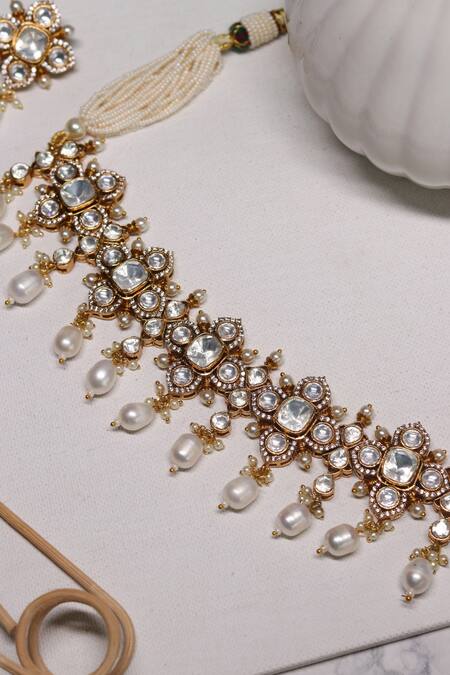Ishhaara Gold Plated Beads Floral Kundan Stone Embellished Choker Necklace Set at Aza Fashions Ishhaara_Gold Plated Beads Floral Kundan Stone Embellished Choker Necklace Set _at_Aza_Fashions