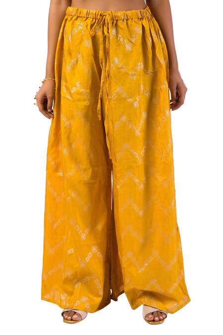 Meghna Shah_Yellow Dola Silk Hand Printed Stones V Neck Kurta With Palazzo Set _at_Aza_Fashions