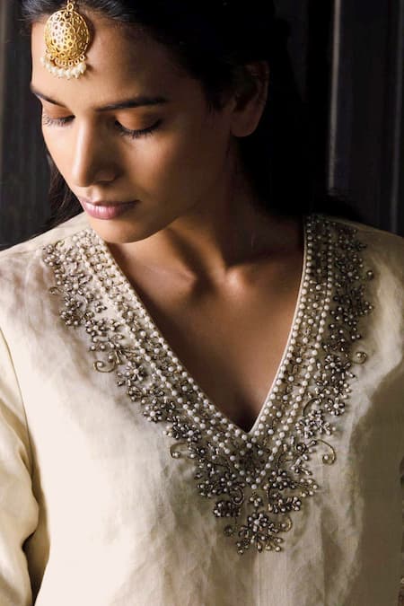 Shorshe Clothing Ivory Handloom Cotton Embroidery, Lace V-neck Noor Kurta And Pant Set at Aza Fashions Shorshe Clothing_Ivory Handloom Cotton Embroidery, Lace V-neck Noor Kurta And Pant Set _at_Aza_Fashions