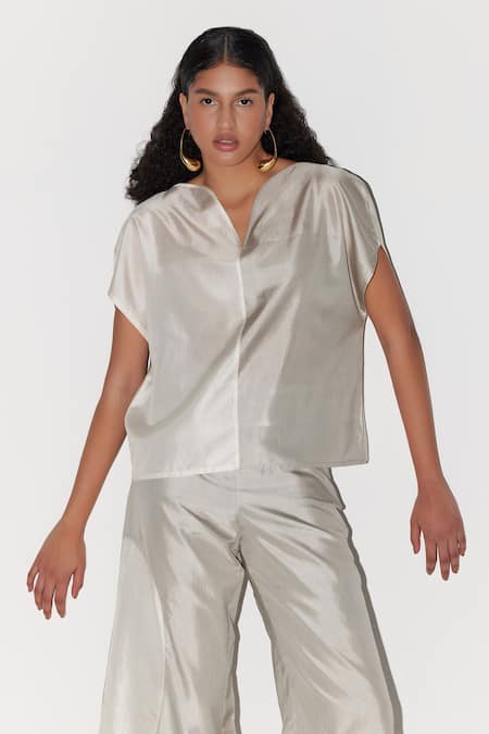 Buy Febo6 Ivory Silk Button-down Neck Arc Two Tone Top Online at Aza Fashions Buy_Febo6_Ivory Silk Button-down Neck Arc Two Tone Top _Online_at_Aza_Fashions