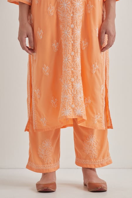 Buy Priya Chaudhary Peach Cotton Embroidery Split V-neck Chikankari Kurta Set Buy_Priya Chaudhary_Peach Cotton Embroidery Split V-neck Chikankari Kurta Set
