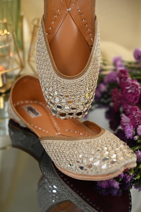 Buy Miar Designs Ivory Resham Thread And Mirror Embroidered Tej Juttis Buy_Miar Designs_Ivory Resham Thread And Mirror Embroidered Tej Juttis