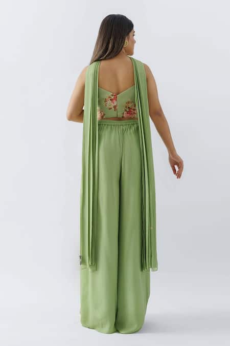 Shop Suruchi Parakh Green Georgette Crepe, Lining Shantoon Pleated Pant With Ruffle Crop Top Set at Aza Fashions Shop_Suruchi Parakh_Green Georgette Crepe, Lining Shantoon Pleated Pant With Ruffle Crop Top Set _at_Aza_Fashions