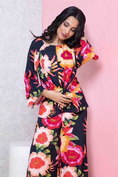Shop_Rhe-Ana_Black Rayon Round Neck Vibrant Floral Print Knotted Top And Pant Set _Online_at_Aza_Fashions