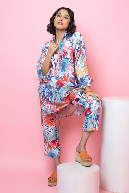 Rhe-Ana Blue Rayon Embroidery Collared Blooming Flower Print Shirt And Pant Co-ord Set at Aza Fashions Rhe-Ana_Blue Rayon Embroidery Collared Blooming Flower Print Shirt And Pant Co-ord Set _at_Aza_Fashions