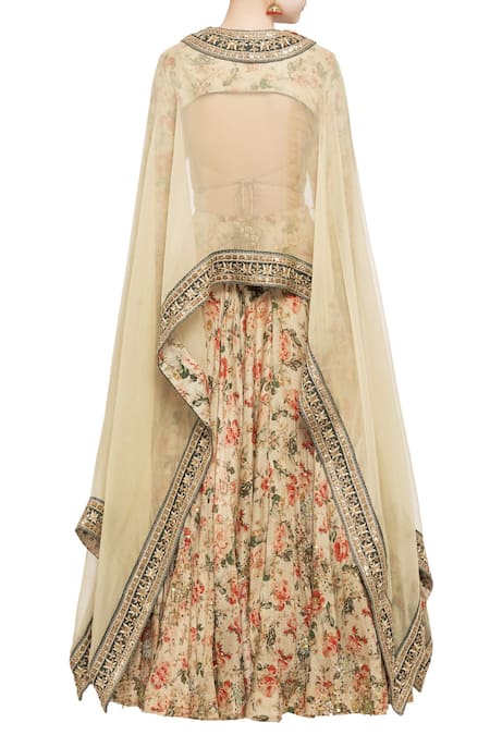 Shop Debyani + CO Beige Organza Floral Round Neck Embellished Cape And Lehenga Set at Aza Fashions Shop_Debyani + CO_Beige Organza Floral Round Neck Embellished Cape And Lehenga Set _at_Aza_Fashions
