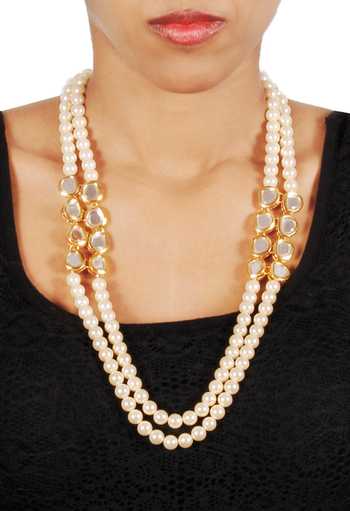 Shop Just Shradhas Gold Plated Kundan And Pearls Embellished Long Necklace at Aza Fashions Shop_Just Shradhas_Gold Plated Kundan And Pearls Embellished Long Necklace _at_Aza_Fashions