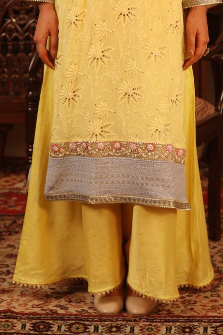 Shop Ruh Clothing Yellow Georgette, Sheer Net Round Chikankari Embroidered Kurta Set Online at Aza Fashions Shop_Ruh Clothing_Yellow Georgette, Sheer Net Round Chikankari Embroidered Kurta Set _Online_at_Aza_Fashions