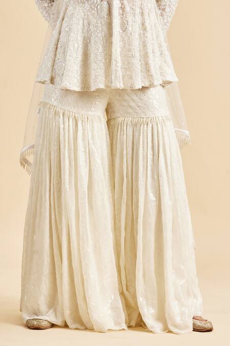 Nitika Gujral Ivory Peplum Top And Gharara Georgette & Dupatta Net Embroidery Floral Set Online at Aza Fashions Nitika Gujral_Ivory Peplum Top And Gharara Georgette & Dupatta Net Embroidery Floral Set _Online_at_Aza_Fashions