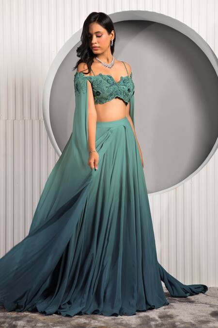 Jade By Ashima Green Crepe Embroidery, Tassels Sweetheart Neck Floral Cape Sleeve Lehenga Set at Aza Fashions Jade By Ashima_Green Crepe Embroidery, Tassels Sweetheart Neck Floral Cape Sleeve Lehenga Set _at_Aza_Fashions