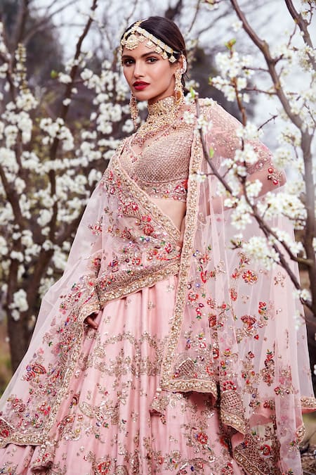 Shop Dolly J Pink Raw Silk, Tulle Floral Motifs V Neck Yuri Embroidered Bridal Lehenga Set at Aza Fashions Shop_Dolly J_Pink Raw Silk, Tulle Floral Motifs V Neck Yuri Embroidered Bridal Lehenga Set _at_Aza_Fashions