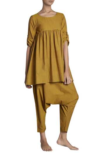 Buy MATI Yellow Handspun Cotton Drop Crotch Pants at Aza Fashions Buy_MATI_Yellow Handspun Cotton Drop Crotch Pants_at_Aza_Fashions