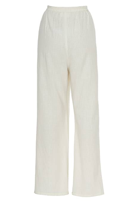 Urvashi Kaur_Beige Cotton High Waist Flared Palazzo _Online_at_Aza_Fashions