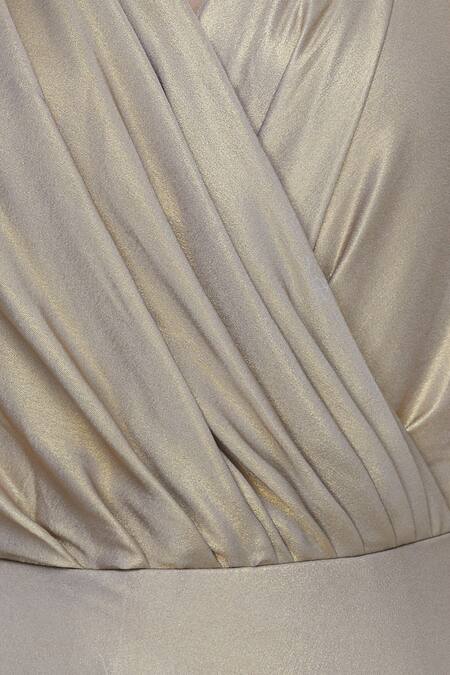 Kommal Sood_Gold Overlap Trail Gown _at_Aza_Fashions