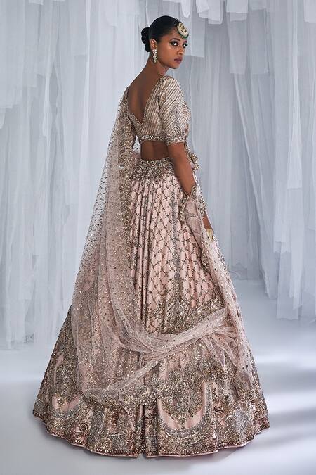 Buy_Dolly J_Peach Silk, Net Embroidery, Beads V-neck Magnolia Raw Bridal Lehenga Set _Online_at_Aza_Fashions