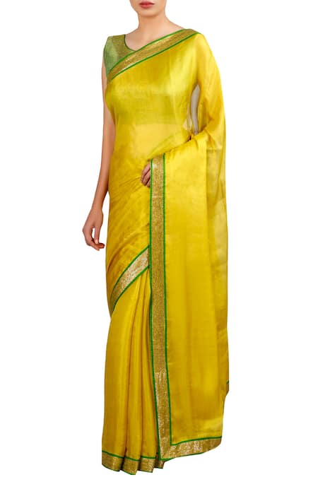 Latha Puttanna Sequin border embroidered saree with sleeveless blouse 