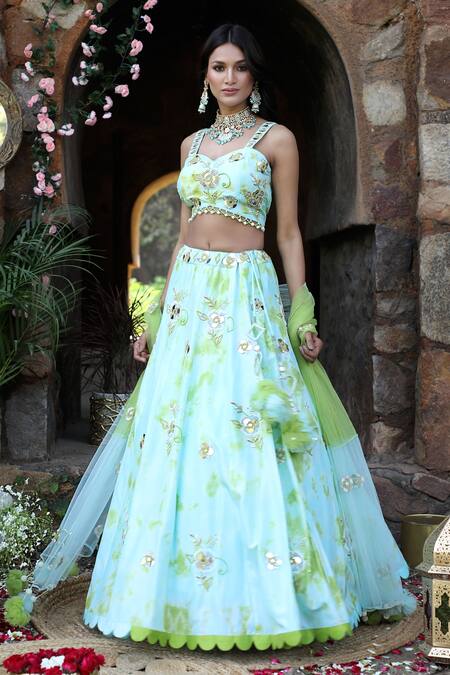 Buy_Nitisha Kashyap Official_Blue Silk, Net Beads, Sequins, Mirrors Floral Embroidered Uppada Lehenga Set _Online_at_Aza_Fashions