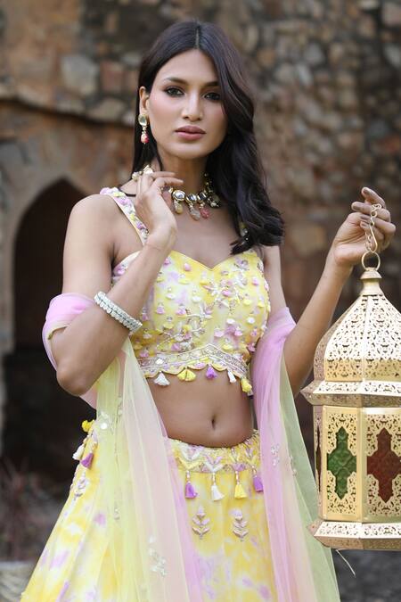 Nitisha Kashyap Official_Yellow Silk, Net Sequins, Cut Work, Mirrors, Scallop Hem Embroidered Lehenga Set _at_Aza_Fashions
