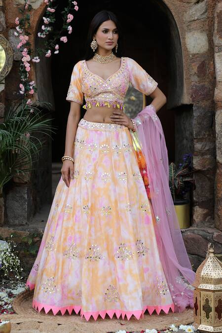 Nitisha Kashyap Official_Pink Net, Silk Sequins, Beads Asymmetric Tie And Dye Embroidered Lehenga Set _Online_at_Aza_Fashions