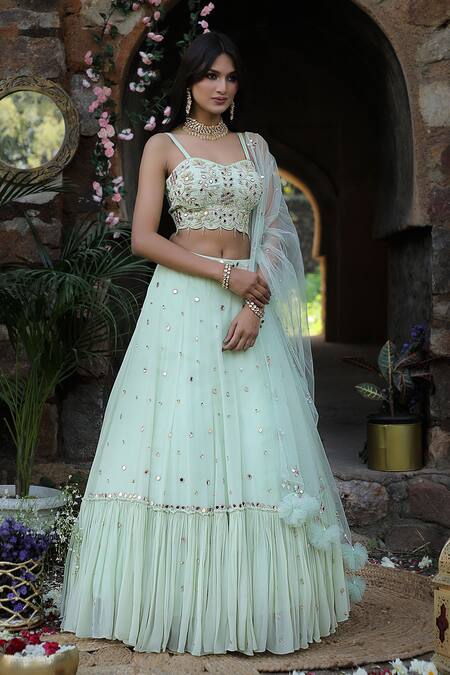 Nitisha Kashyap Official_Green Georgette, Net, Silk Beads, Mirrors, Zari Embroidered Tiered Lehenga Set _Online_at_Aza_Fashions