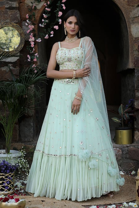 Buy_Nitisha Kashyap Official_Green Georgette, Net, Silk Beads, Mirrors, Zari Embroidered Tiered Lehenga Set _Online_at_Aza_Fashions