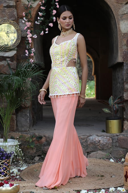 Shop_Nitisha Kashyap Official_Peach Georgette, Silk Tassels, Embroidery, Short Kurta And Sharara Pant Set _Online_at_Aza_Fashions