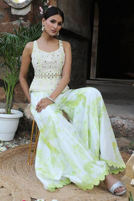 Nitisha Kashyap Official_Off White Silk Beads, Zari, Embroidery, Mirrors Peplum Top And Sharara Pant Set _at_Aza_Fashions